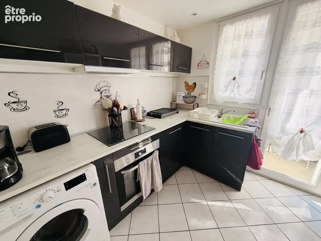 Appartement T2 de 48 m2 avec terrasse et cave - Saint-Quentin 02100 - photo 2