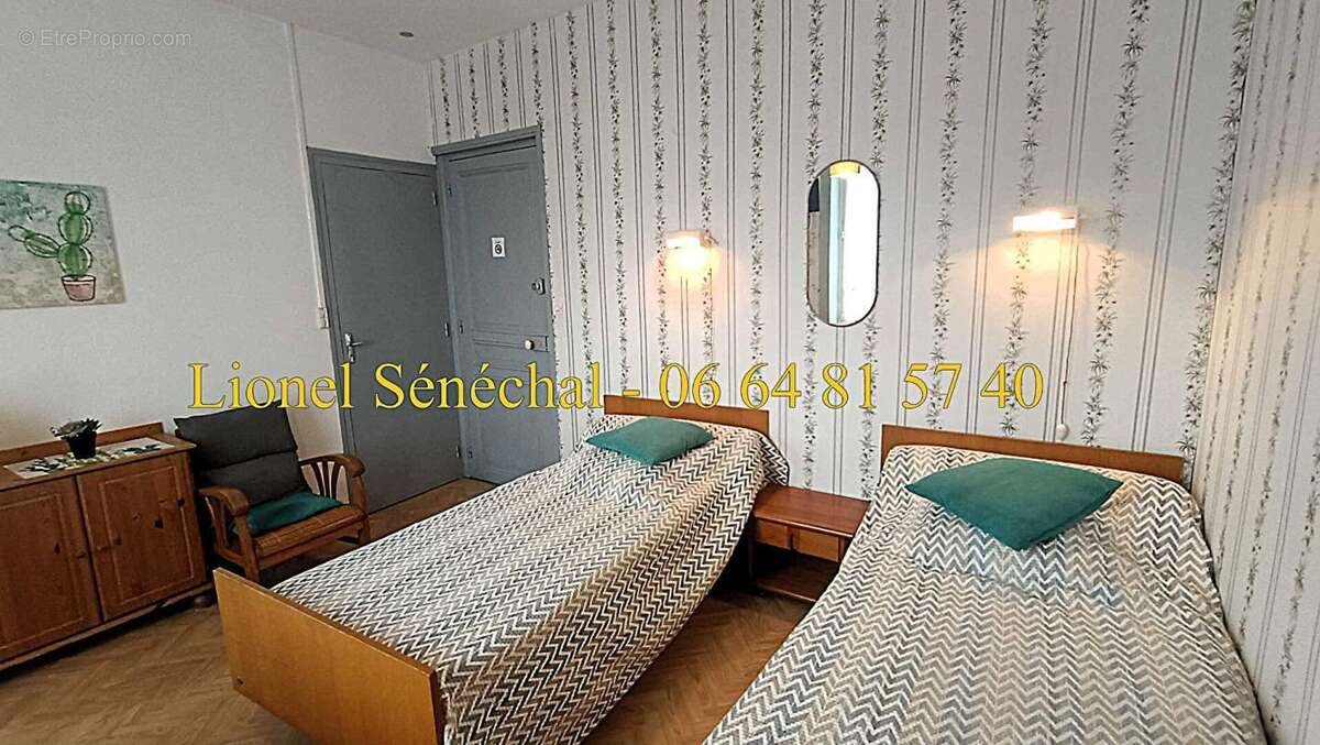 Opportunité rare : immeuble de caractère avec 12 studios dans une demeure de prestige en plein centre-ville de Bagnoles-de-l'Orn - photo 6