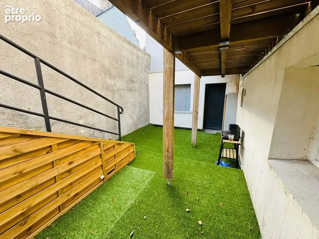 Appartement rdc avec cour - photo 7