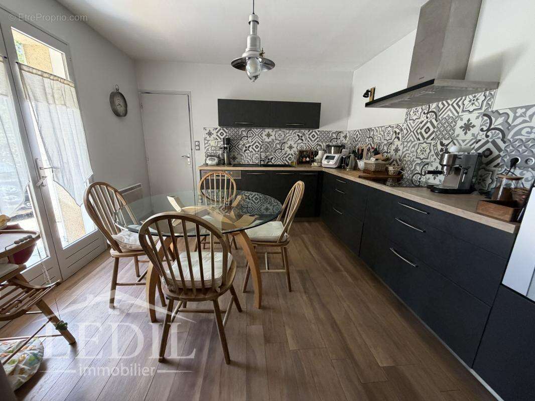 PLAIN-PIED avec garage et jardin clos - photo 4