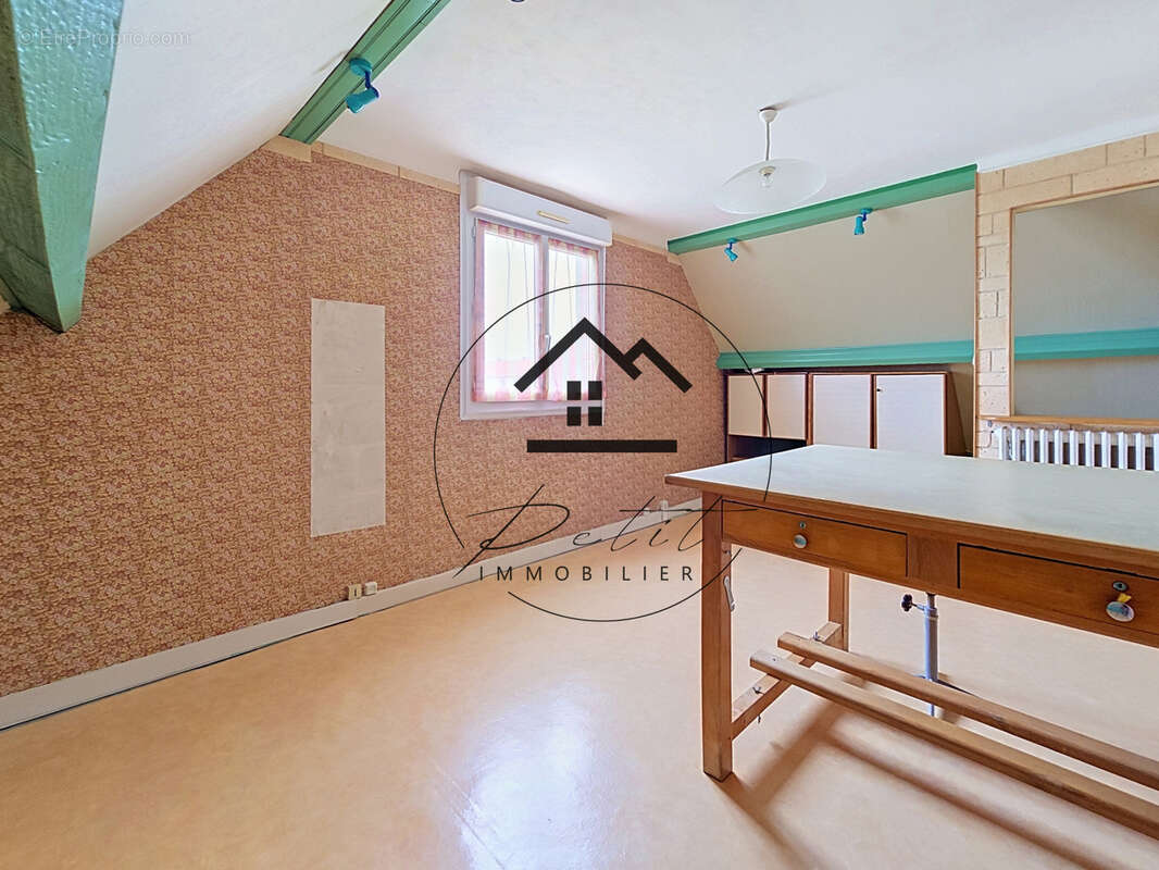 Maison familiale de 107 m2 avec 4 chambres et sous-sol total - photo 11