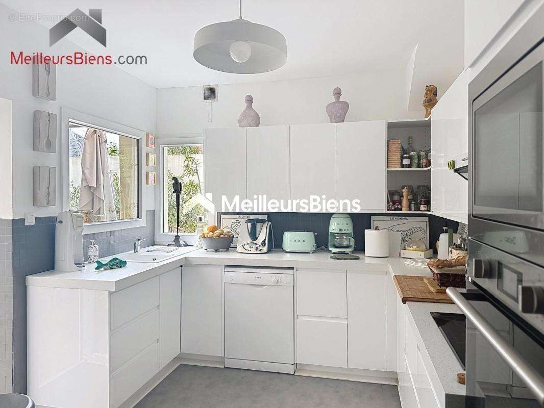Élégante maison de caractère – 170 m² – Volumes et art de vivre - photo 5