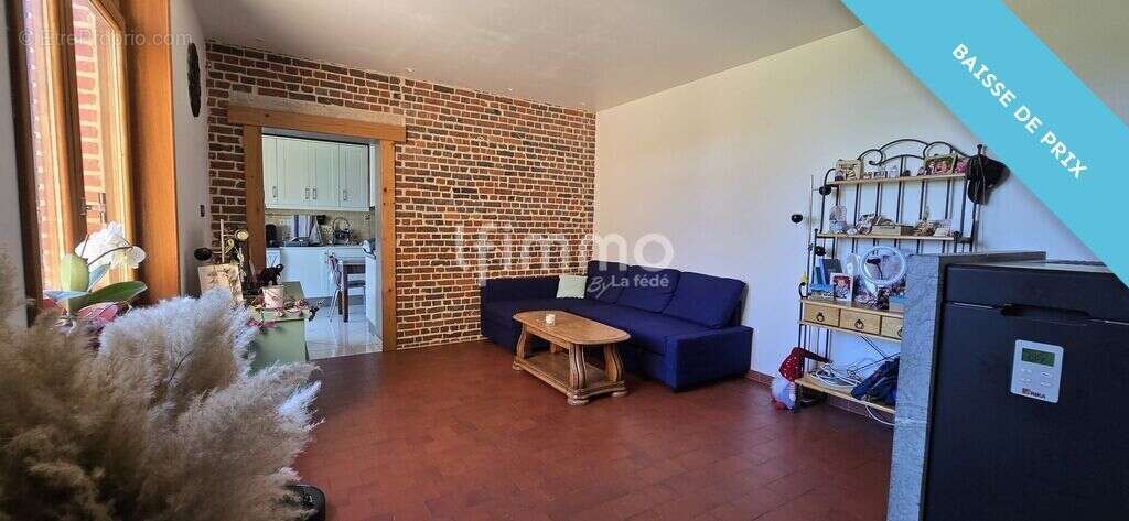 Maison avec jardin et garage – Une belle opportunité à saisir ! - photo 8