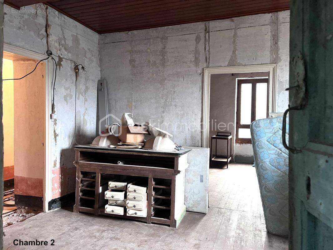 Maison en pierre R+1 de 144 m2 habitable avec combles de 63 m2 et cave voutée en sous sol de 88 m2 - photo 5