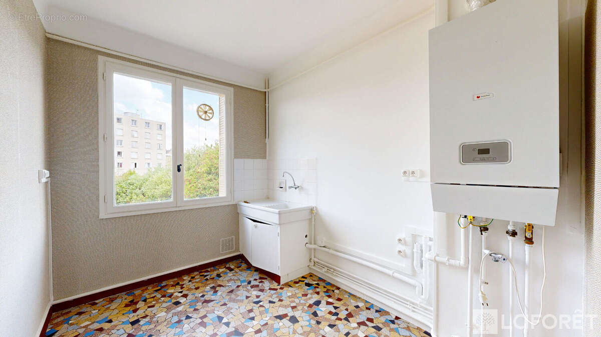 Appartement T3 - MOULINS - photo 4