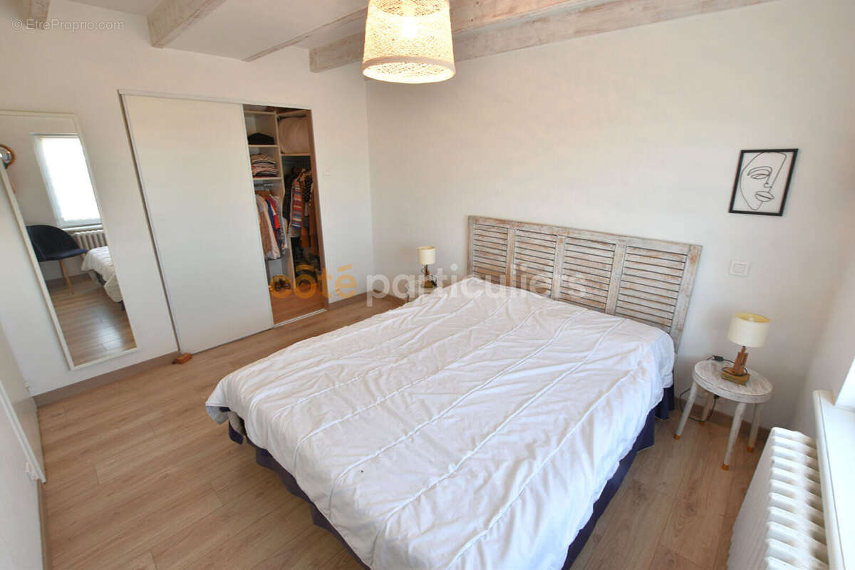 Maison de caractère avec espace commercial de 73 m² - photo 11