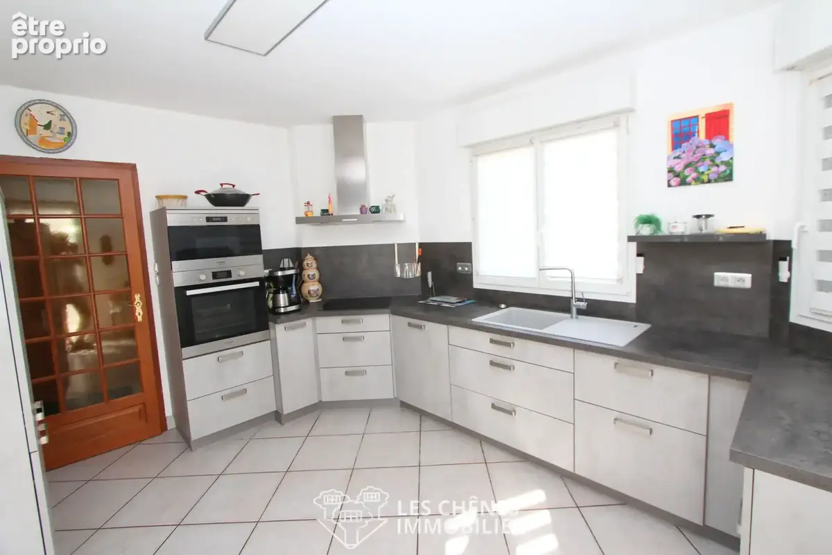 Maison de plain-pied   90 m2   terrain de 6.81ares   garage - photo 3