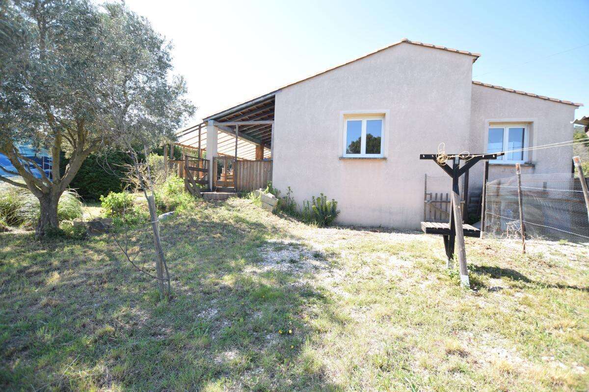 Maison à LAUDUN-L'ARDOISE