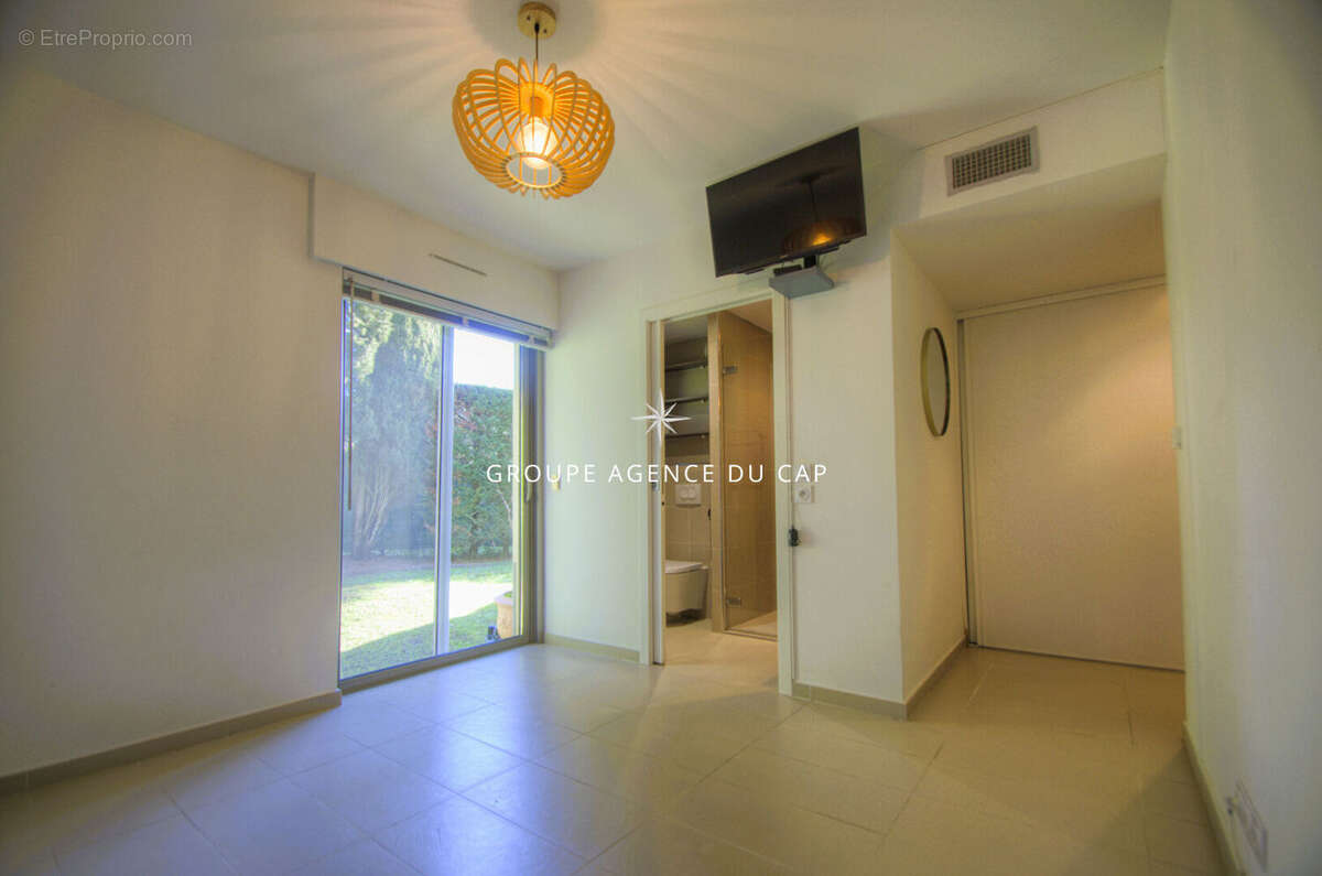 Appartement en rez de jardin dans residence - photo 8