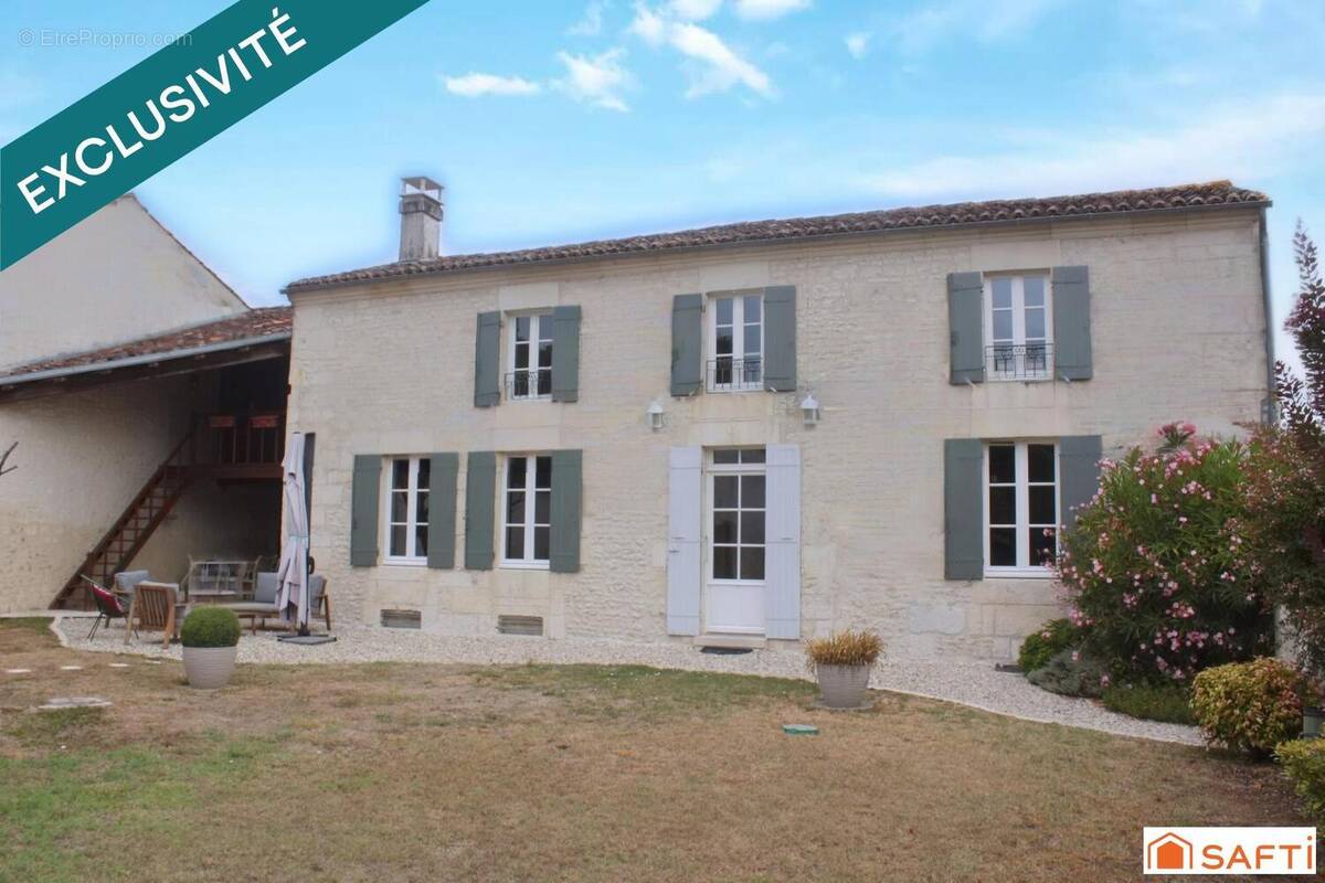 Photo 1 - Maison à PREGUILLAC