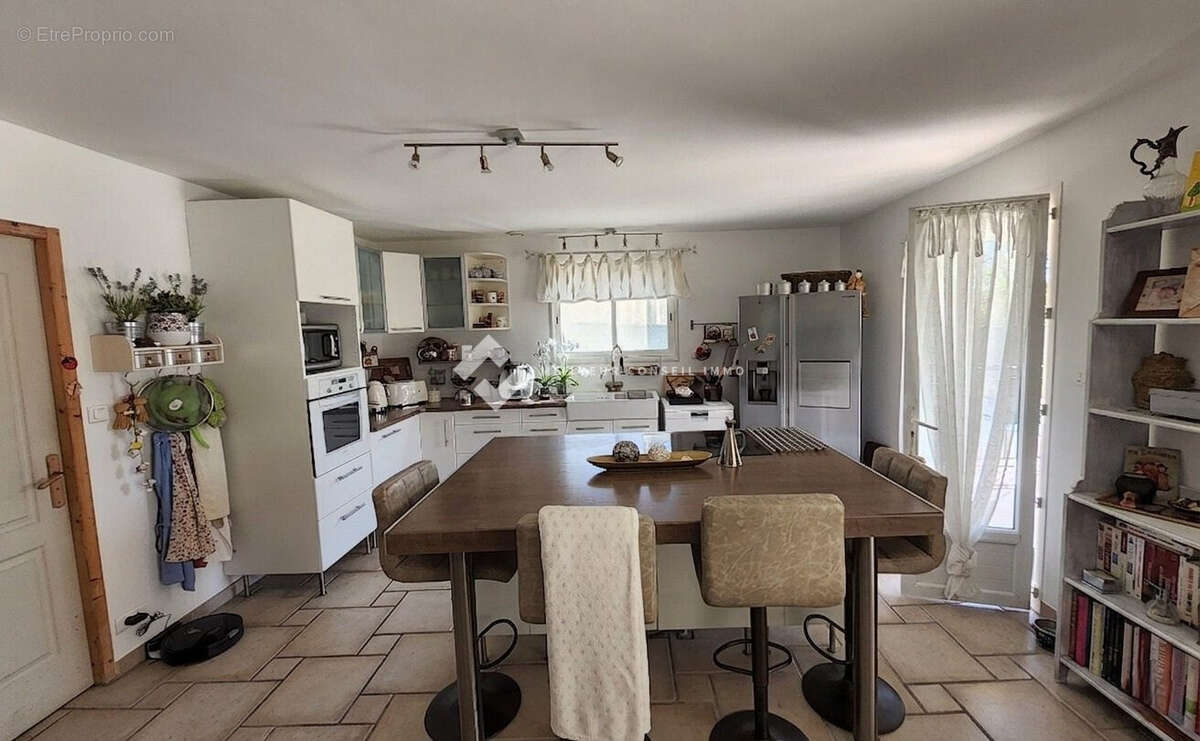 Maison 130 m² à Saint-Julien-De-Cassagnas  - photo 9