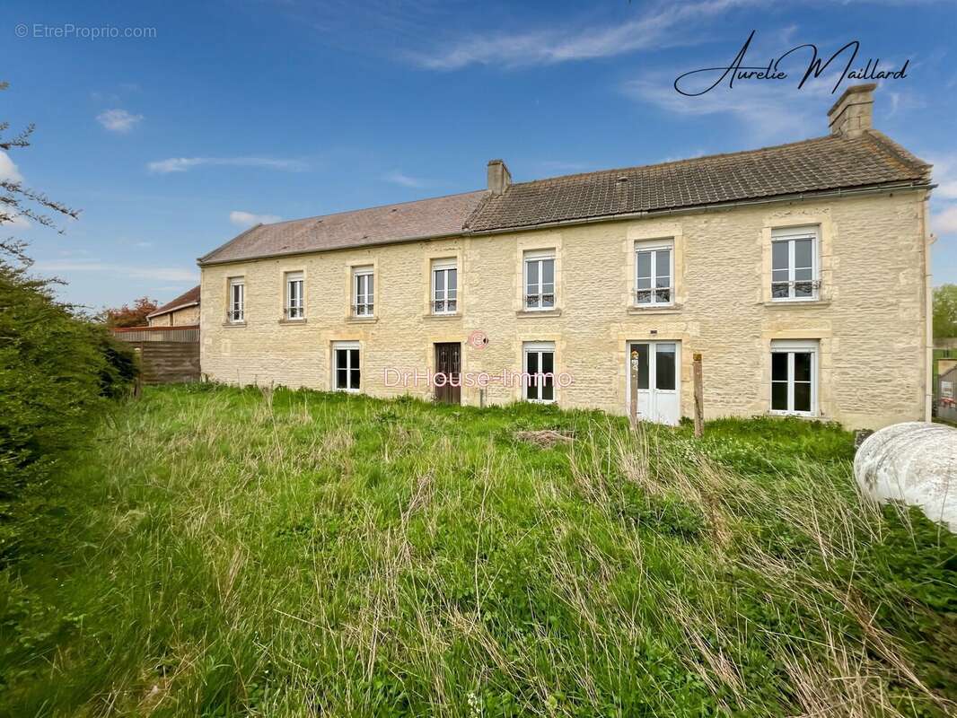 Maison à SAINT-AIGNAN-DE-CRAMESNIL