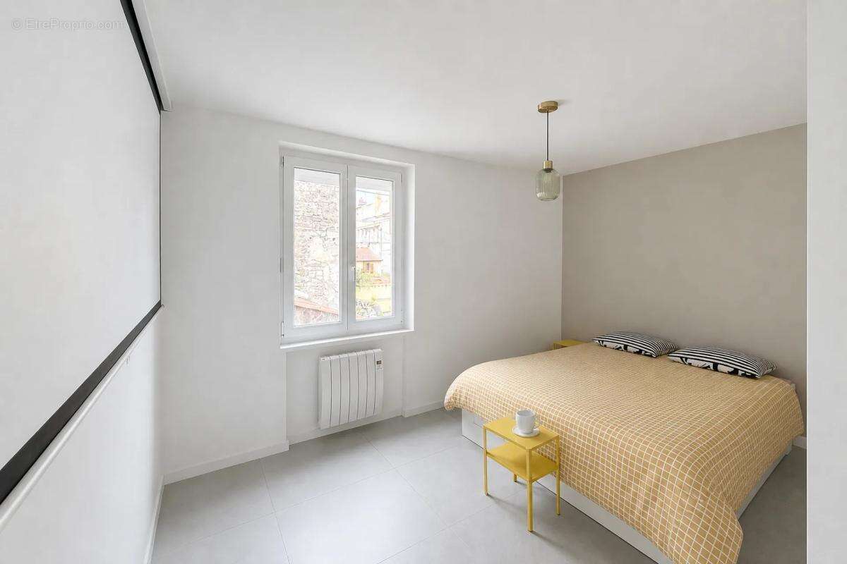 Appartement de 4 pièces de 109 m² à Saint-Étienne - photo 6