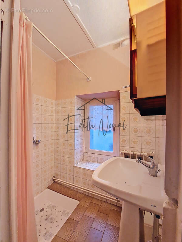 Duplex à rénover au cœur de Millau : le potentiel à l’état pur ! - photo 12