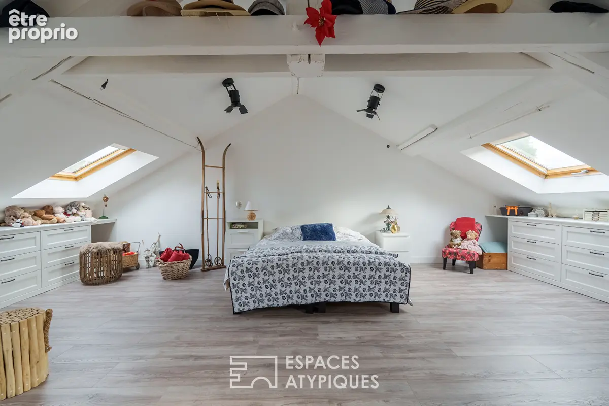 Appartement sous les toits à la charpente apparente - photo 5