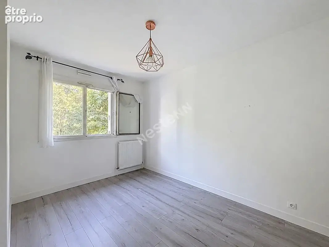 Appartement 4 pièces à vendre à Rezé - 3 chambres, balcon, cave - photo 4