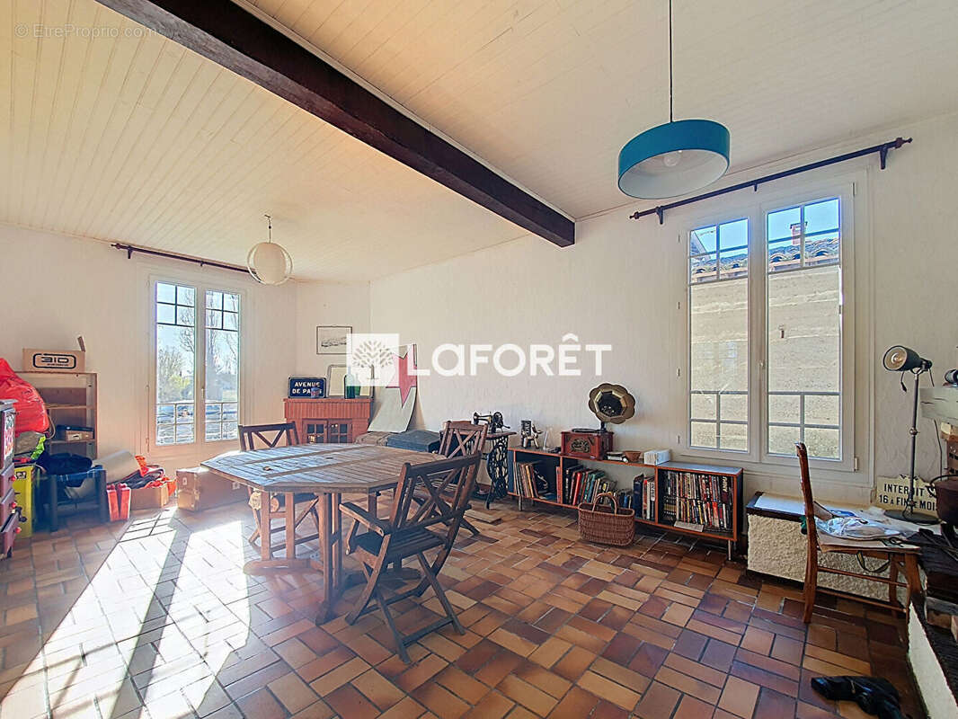 Maison de type 4  de 125 m² avec jardin. - photo 11