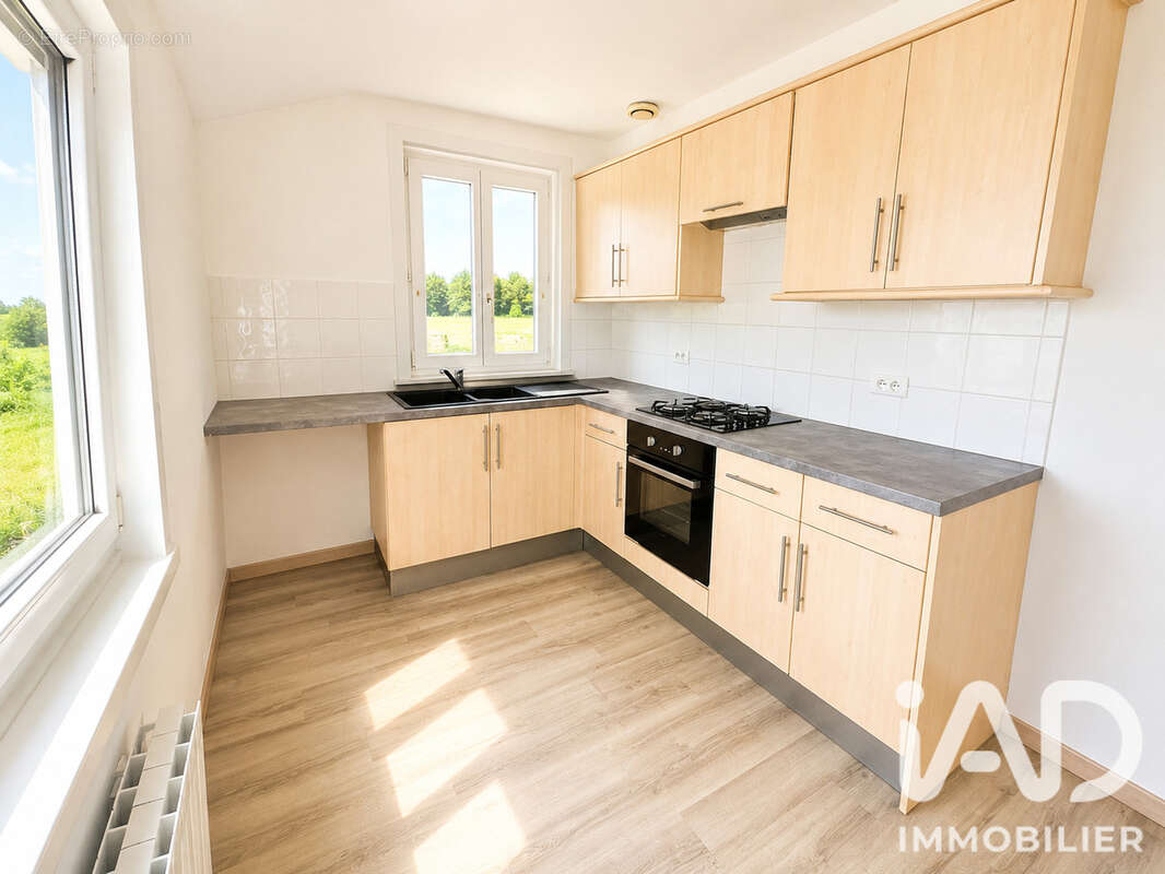Maison 80 m² à Mons-En-Pevele  - photo 7
