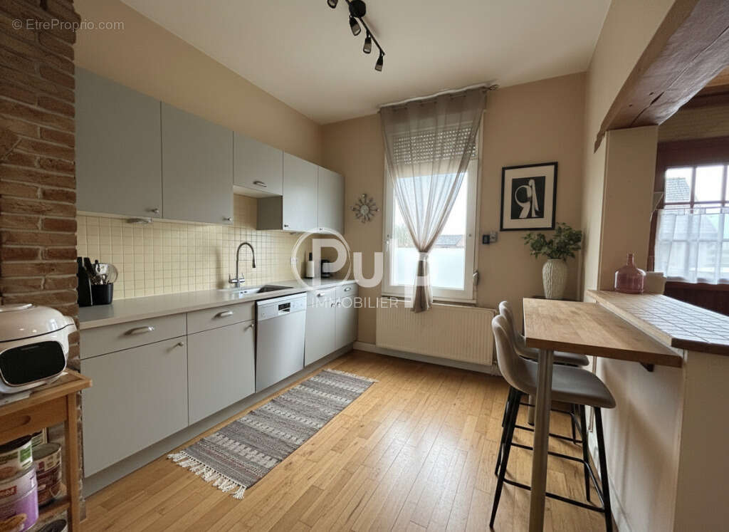 Maison à CALONNE-SUR-LA-LYS