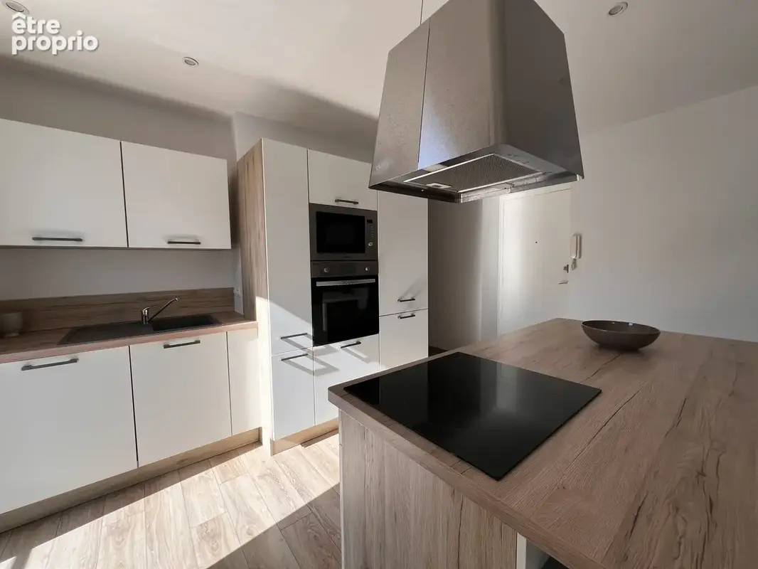 Superbe t2 entièrement rénové avec balcon plein sud - photo 2
