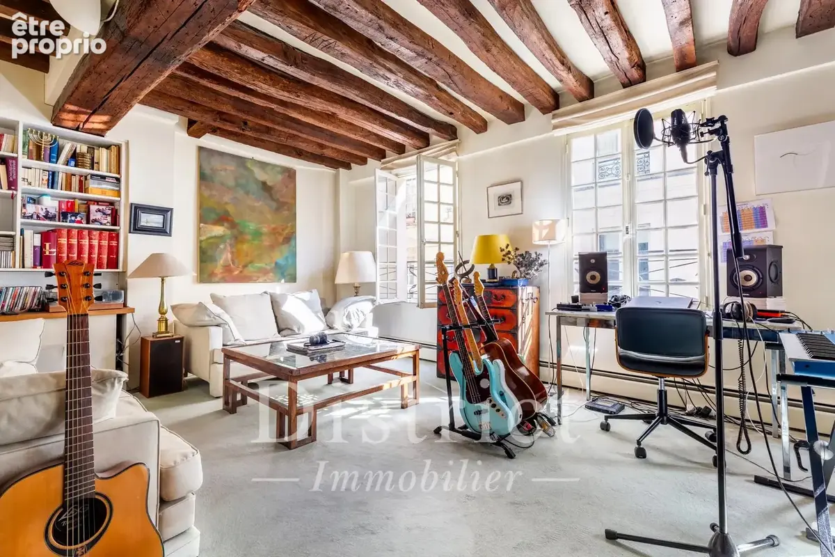 Ile Saint Louis. 5 pièces de 113m² en étage élevé avec ascenseur. - photo 3