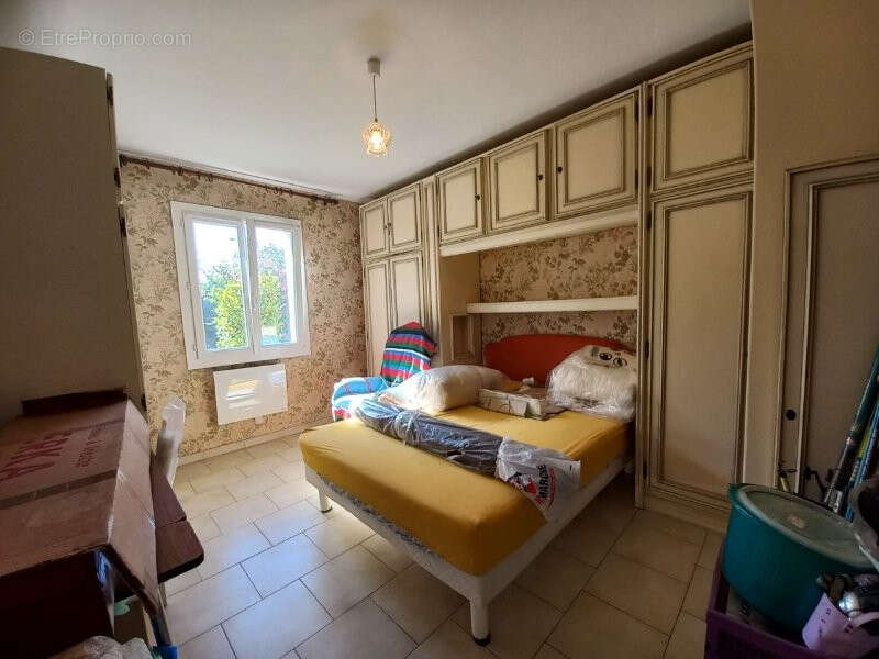Maison de plain-pied à rafraîchir - Proche centre-ville - photo 8