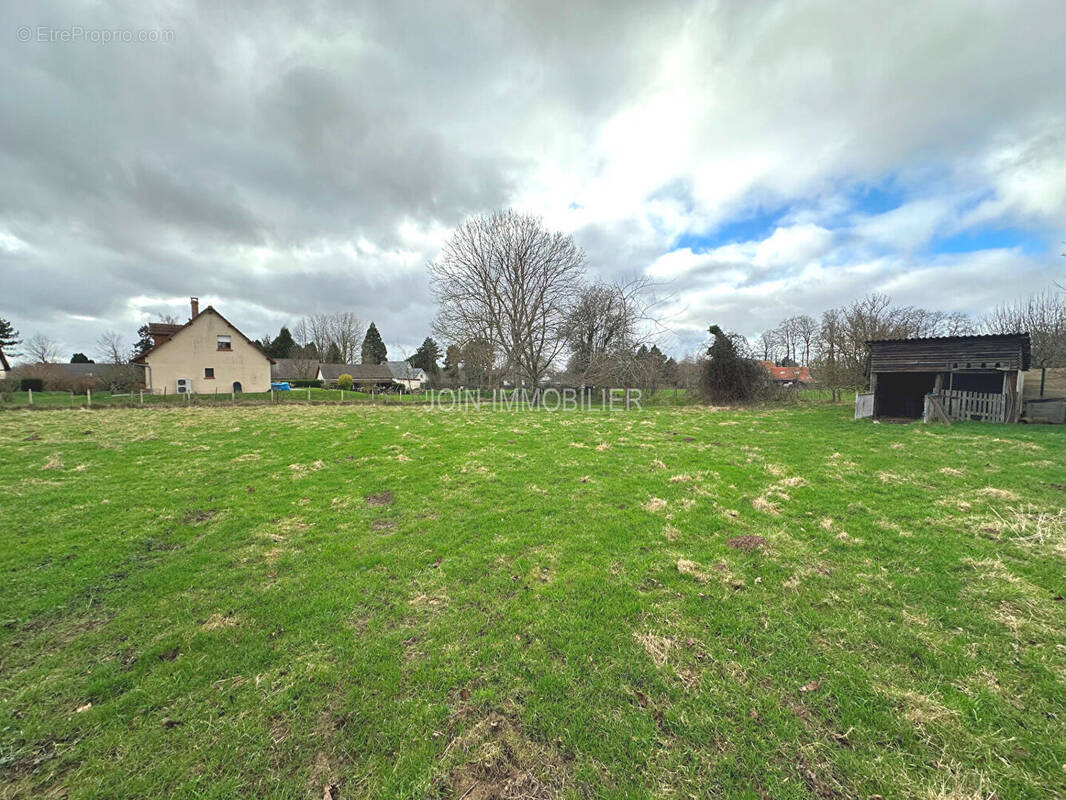 Terrain à TOURVILLE-SUR-ARQUES