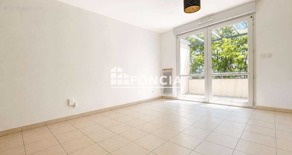 Type 2 avec terrasse privative et un parking en sous sol - photo 2
