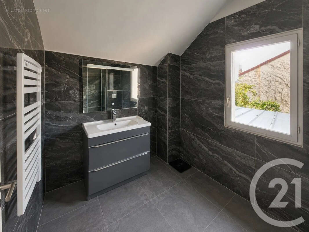 Maison 115 m² à Saint-Maur-Des-Fosses  - photo 17