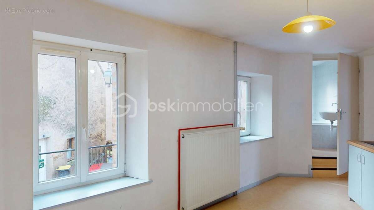 Maison  Fougerolles composée de : (un ancien local commercial , un T1 et un T3) - photo 11