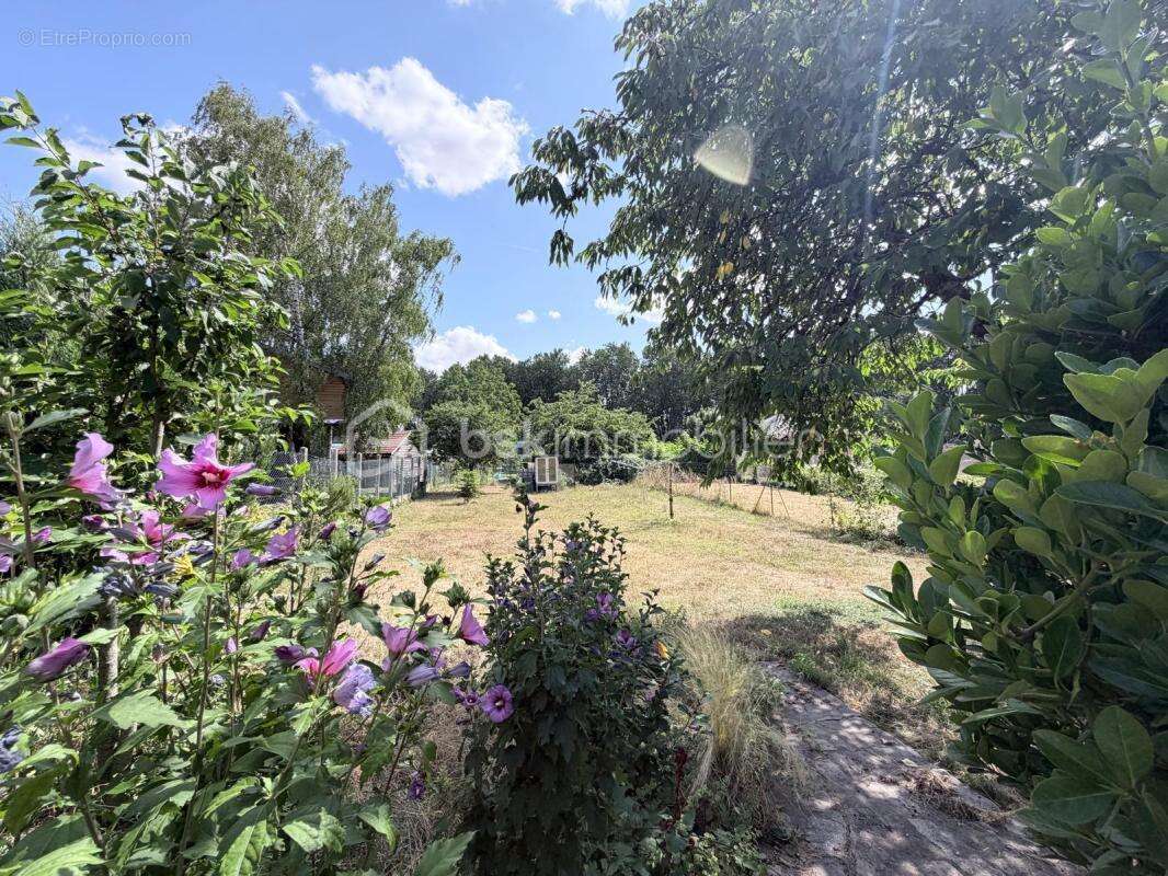 Maison familiale de 107 m² avec garage, jardin et dépendances à Saint-Quentin - photo 10