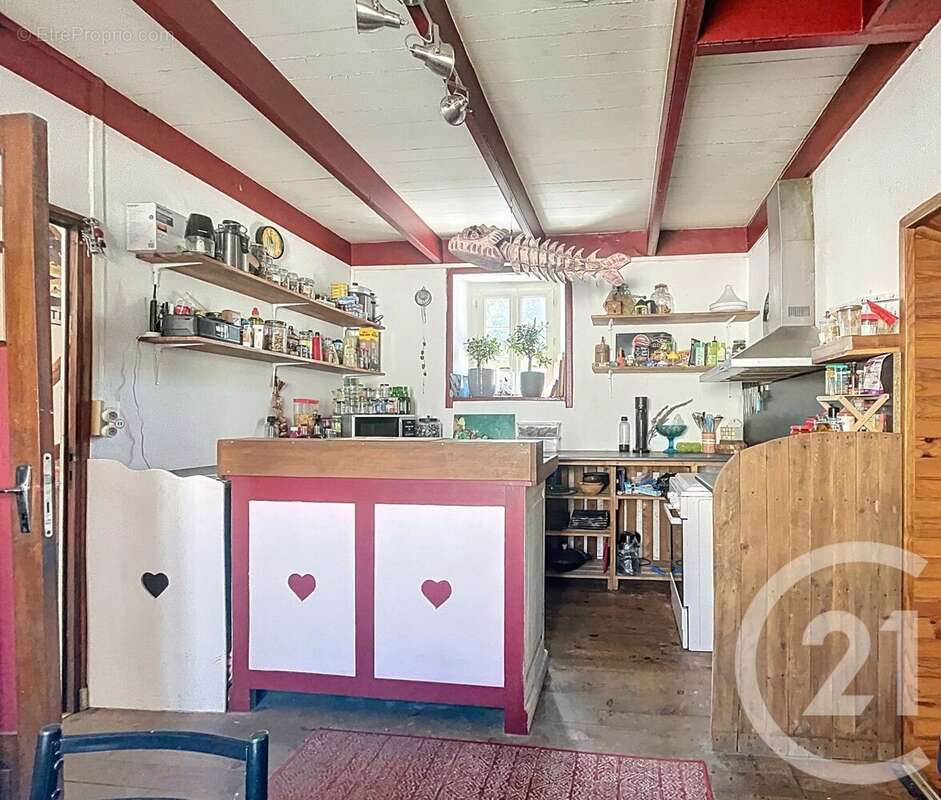 Maison 106 m² à Belle-Isle-En-Terre  - photo 4