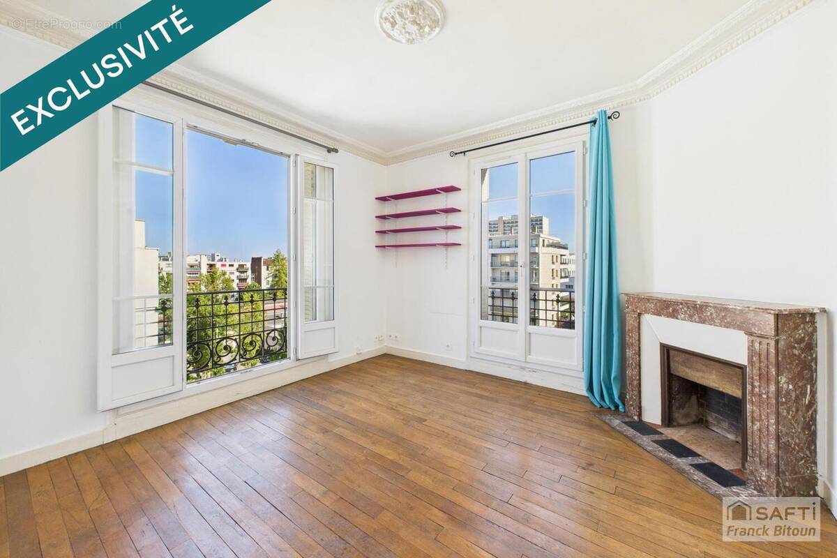 Photo 1 - Appartement à COURBEVOIE