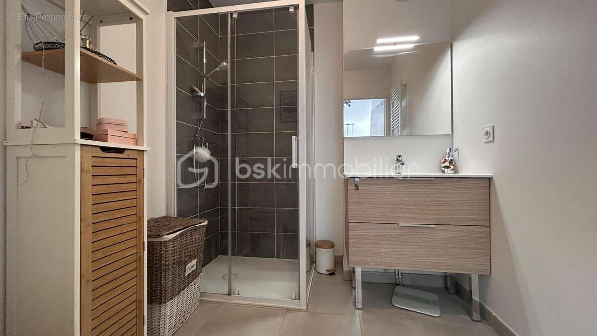 T2 récent 43 m² avec balcon 9,4 m² + parking sous-sol - photo 7