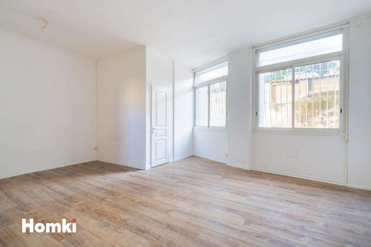 Appartement T2 de 46m2 + local / Atelier de 61m2 - photo 3