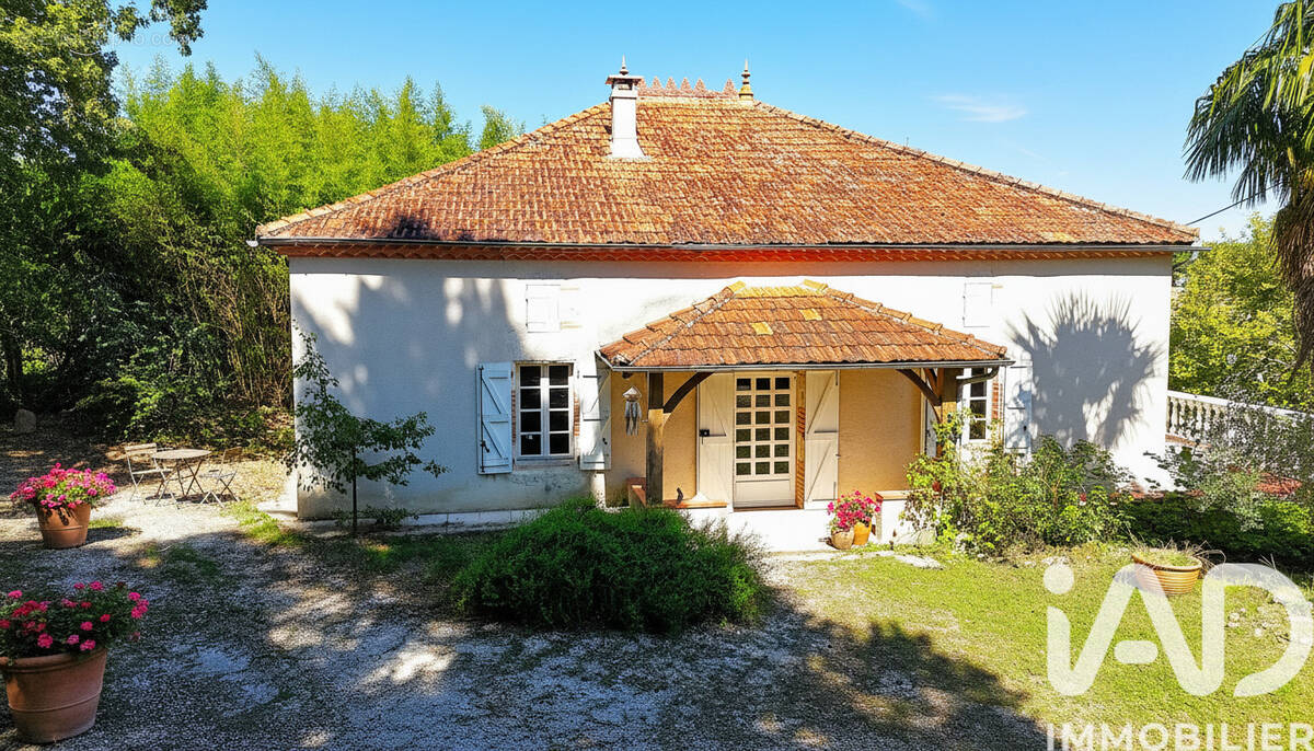 Photo 1 - Maison à SAINT-NAZAIRE-DE-VALENTANE