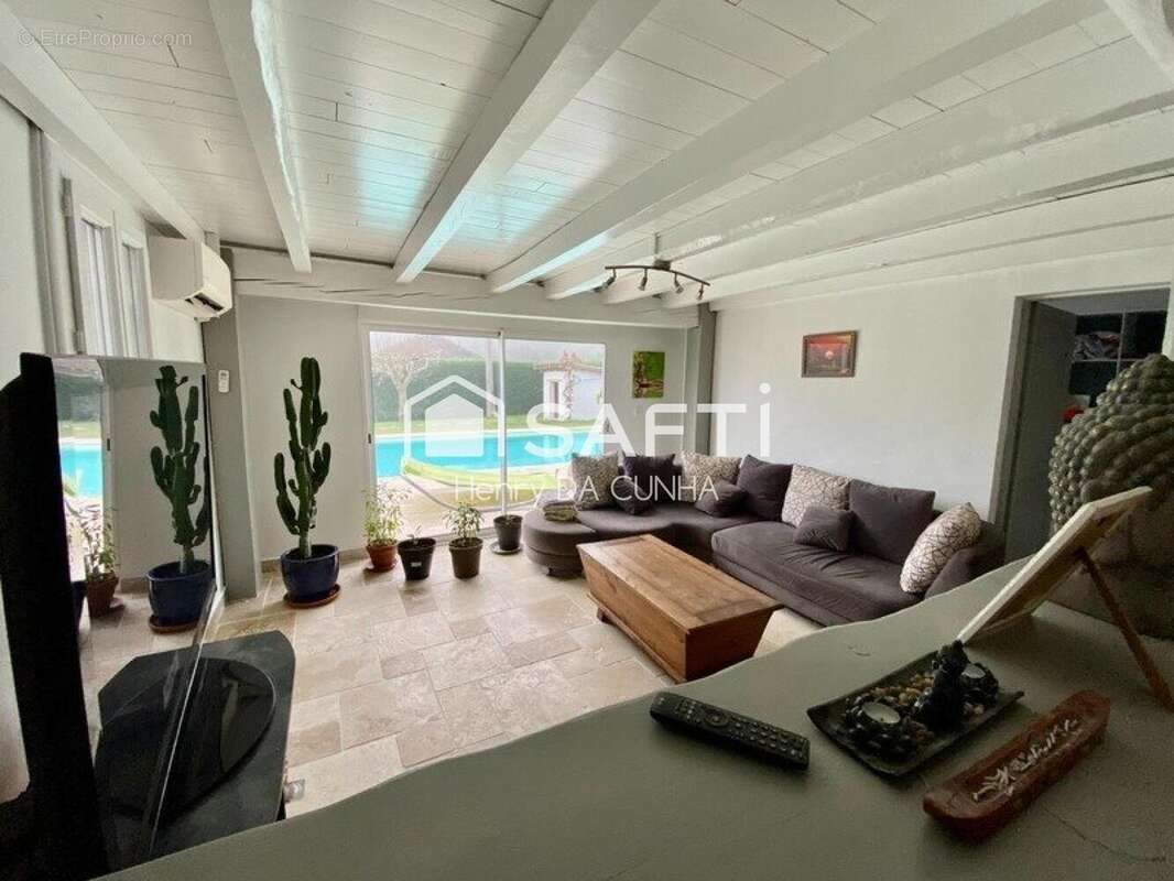 Photo 2 - Maison à YGOS-SAINT-SATURNIN