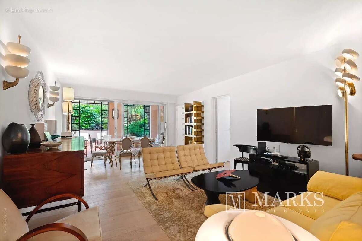 Généreux appartement de 3 chambres en rez-de-jardin - photo 9