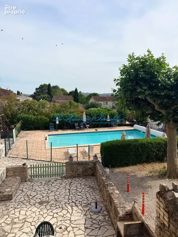 CANAULES ET ARGENTIERES, dans une maison en pierres de  caractère, appartement T3 de 80 m2 en RDC avec terrass - photo 2