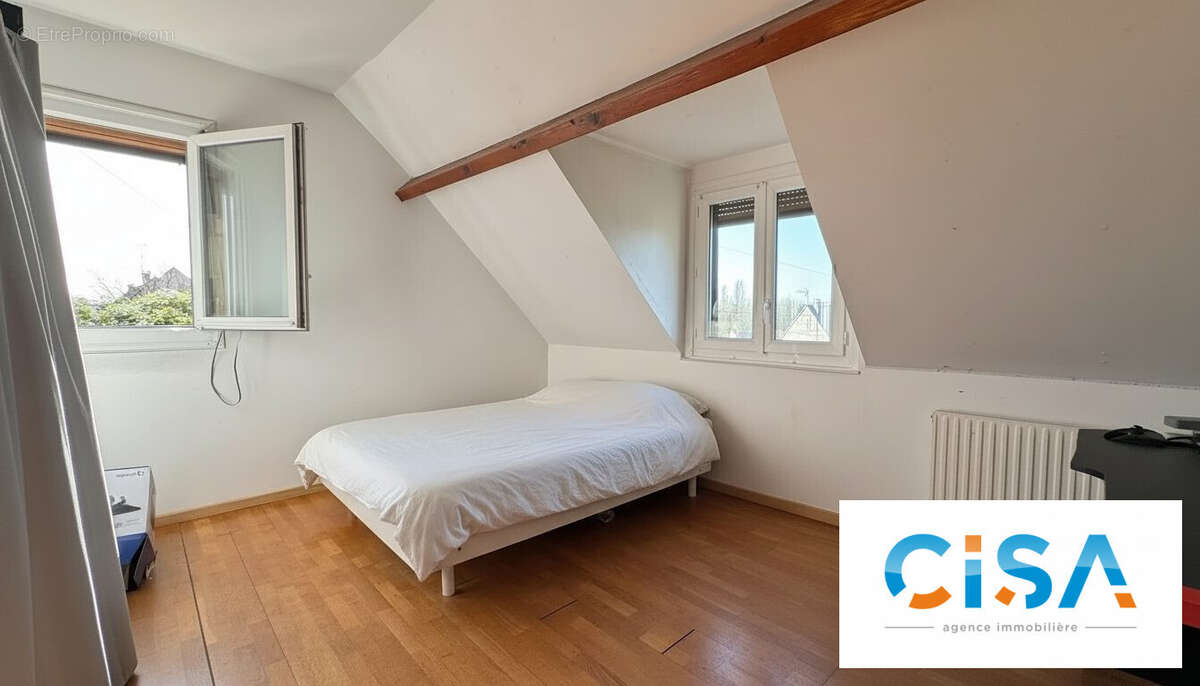 Maison à MOGNEVILLE