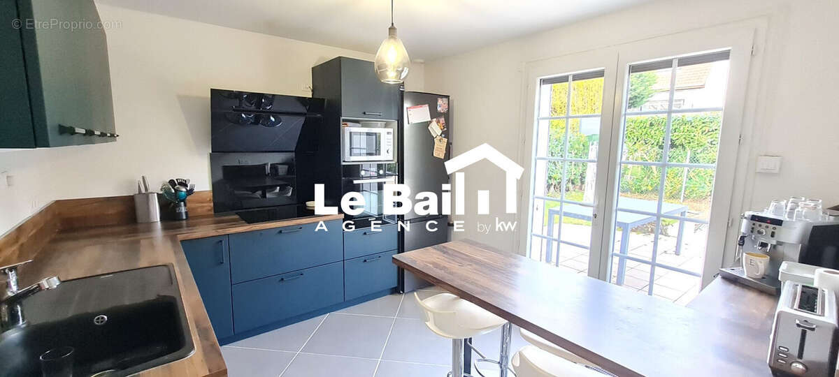 Maison 130 m² à Osny  - photo 4