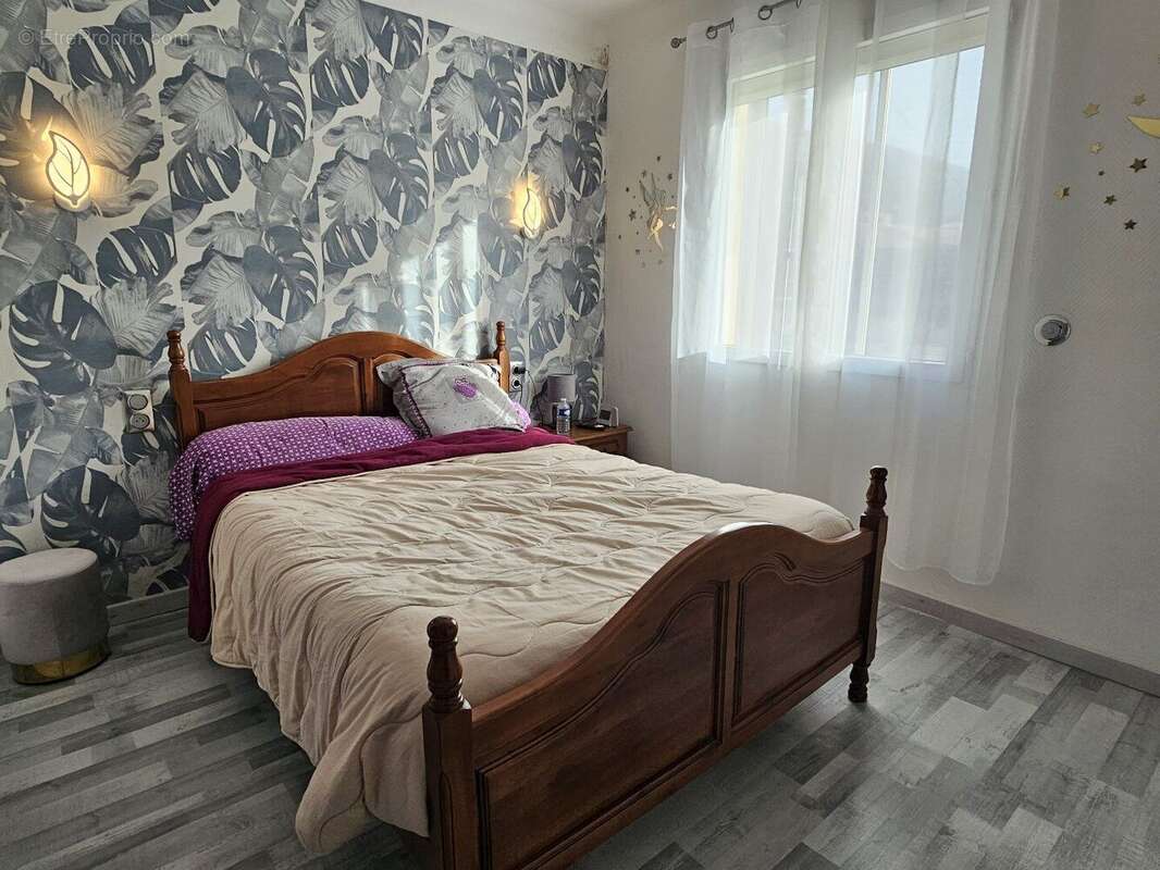 Maison en vie de plain-pied avec jardin et garage - photo 3