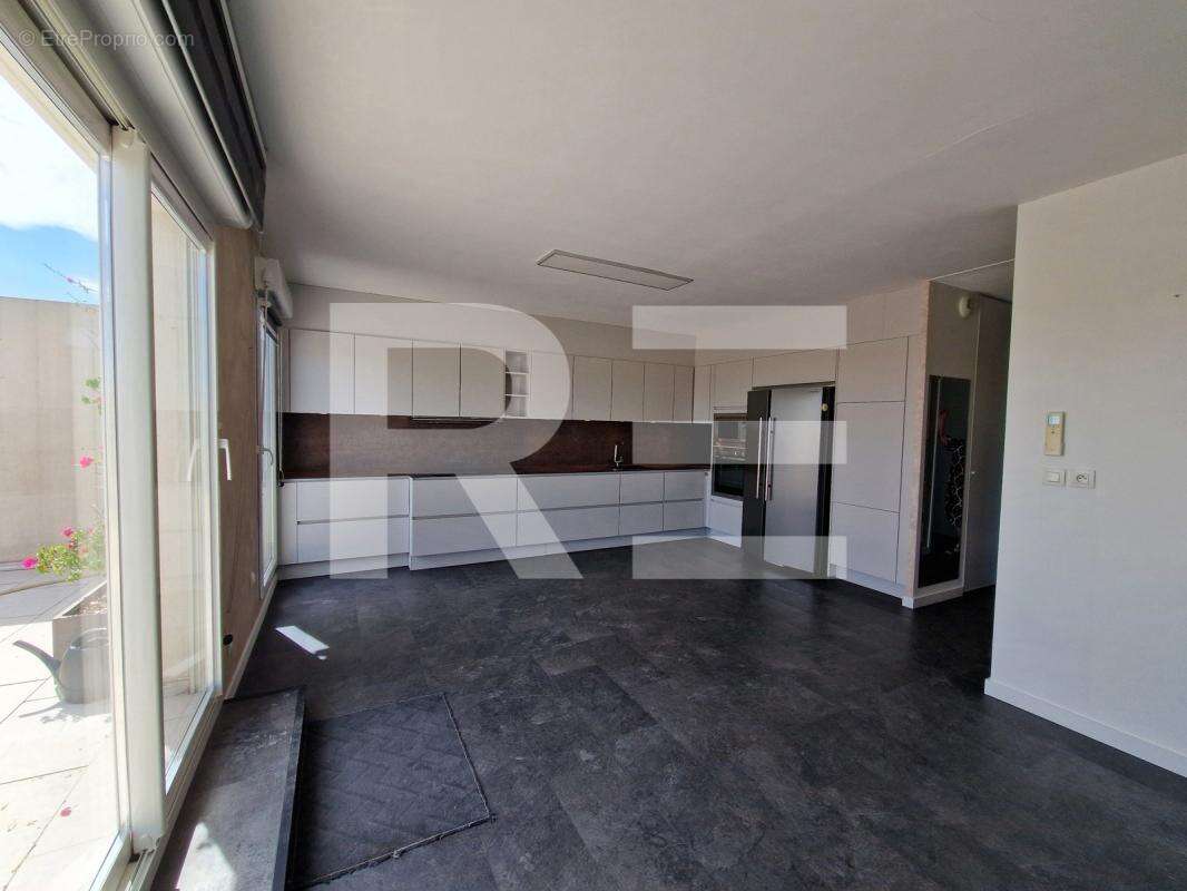 Nimes appartement 69 m² 2 chambres terrasse 42 m² garage - photo 4