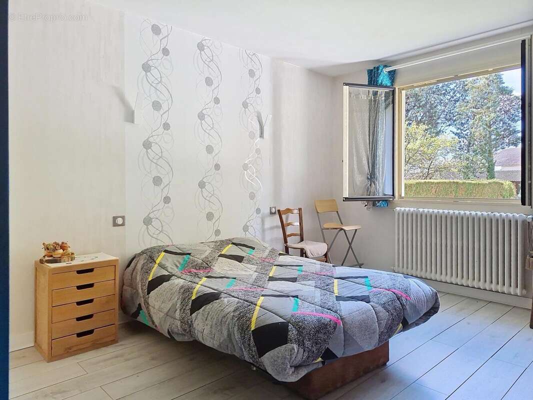 Maison 121 m² à Guesnes  - photo 7