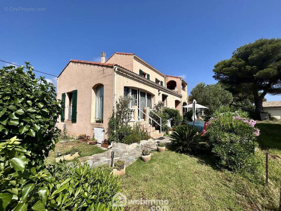 Maison de 1980 sur 2 niveaux