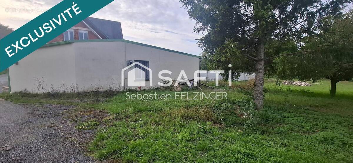 Photo 1 - Commerce à CLACY-ET-THIERRET