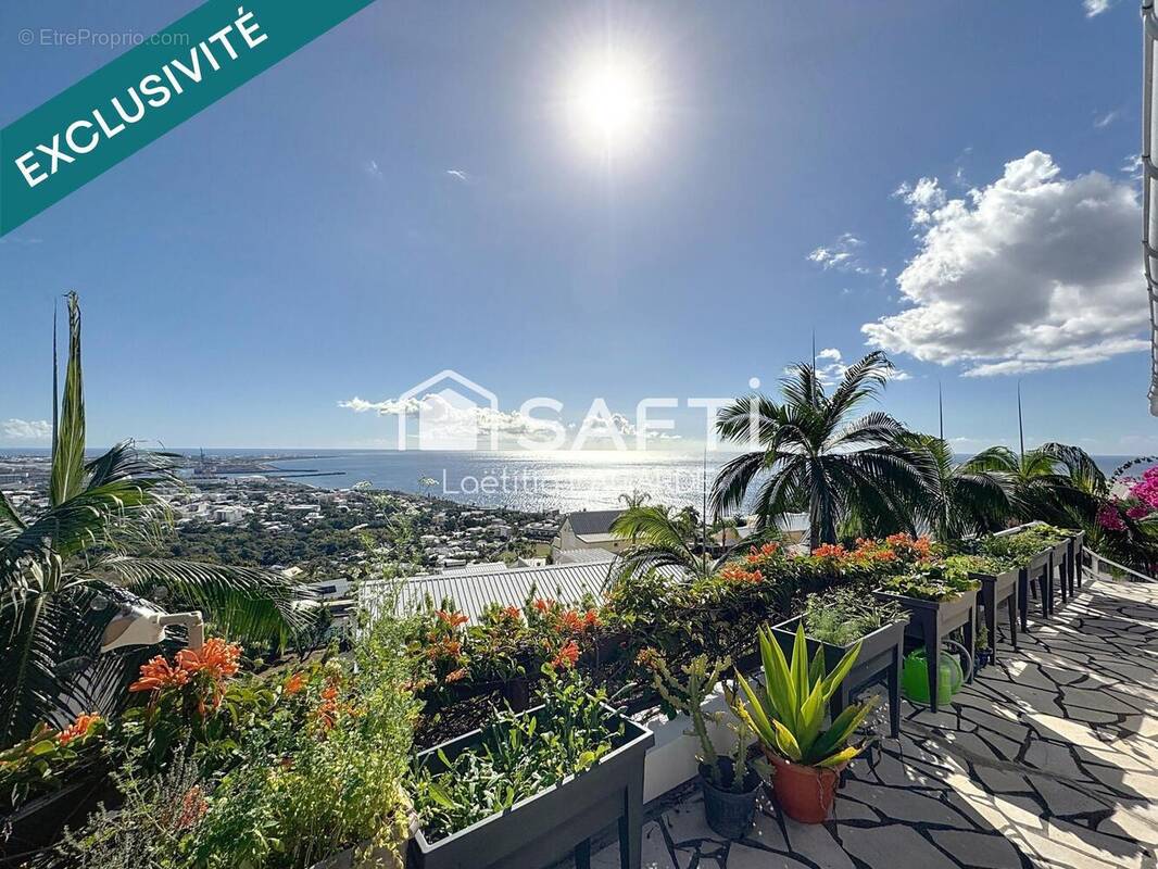 Photo 1 - Maison à LA POSSESSION