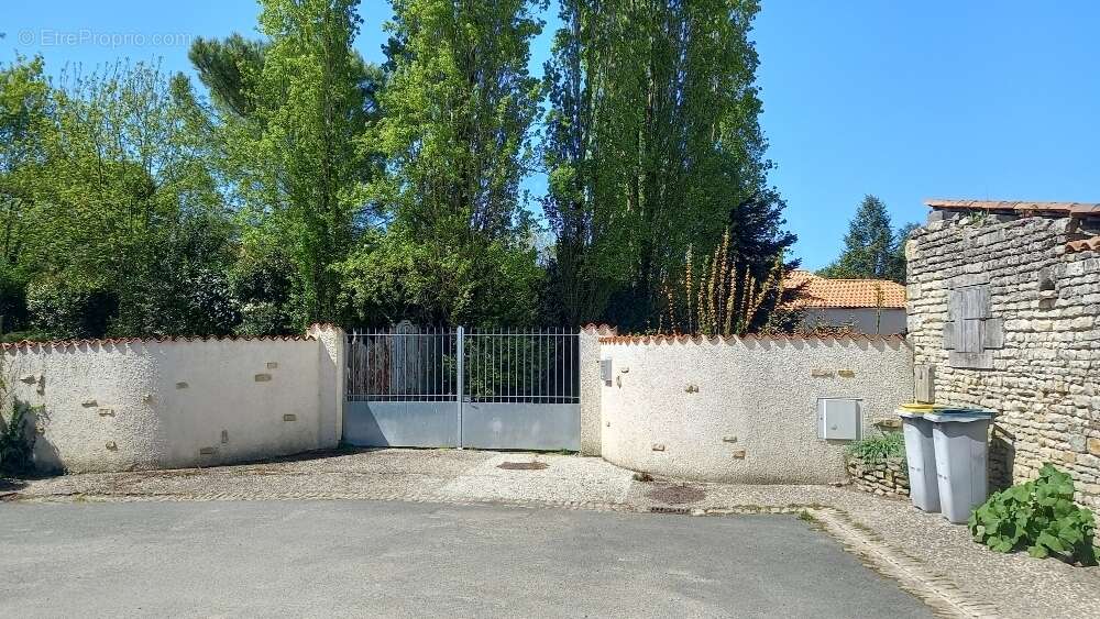 Maison de 7 piéces au coeur du village - photo 3