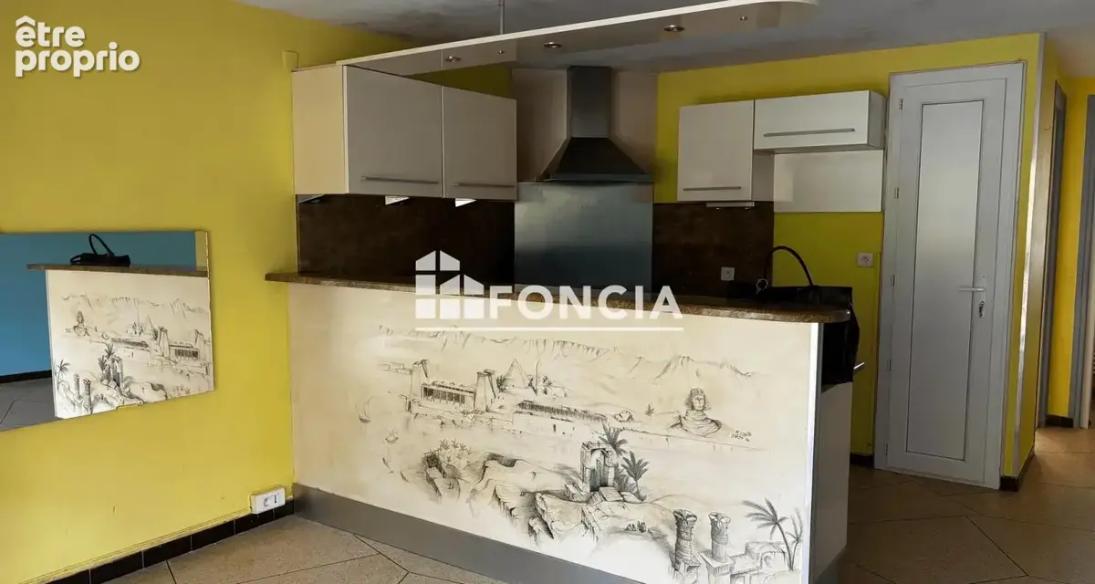 À VENDRE – Appartement en rez-de-jardin avec grande terrasse - photo 1