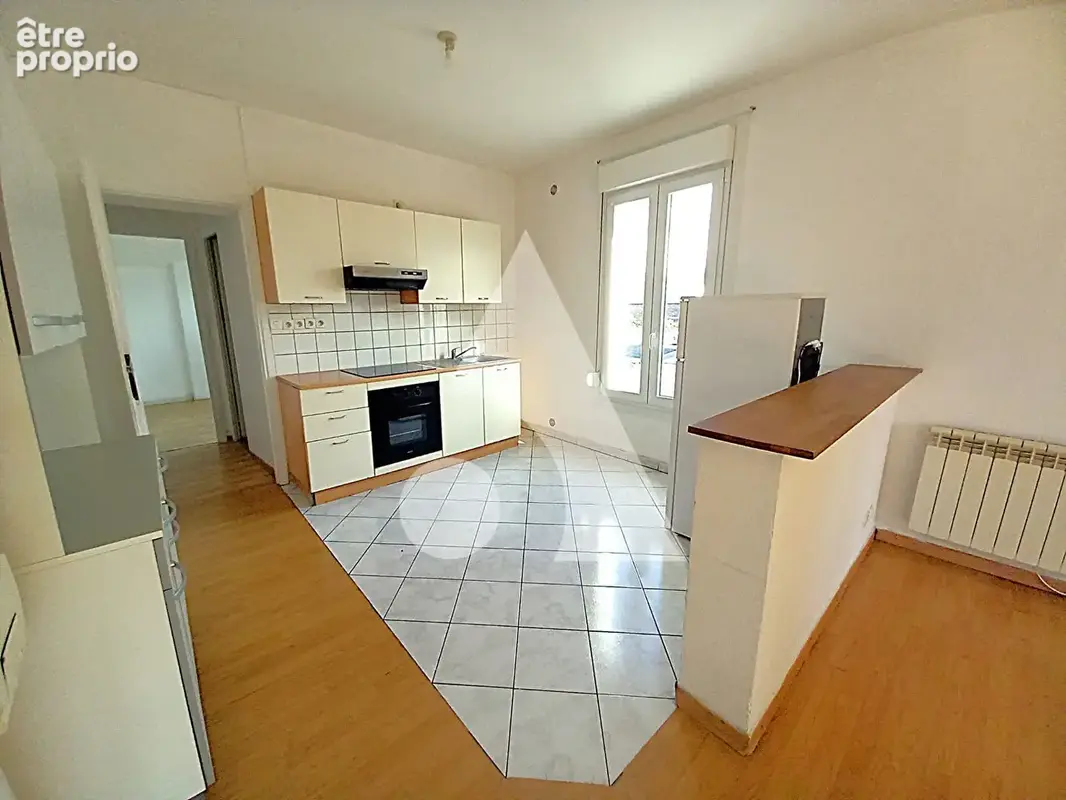 Immeuble de rapport à Maubeuge : 5 logements, un commerce et un potentiel locatif à étudier - photo 8